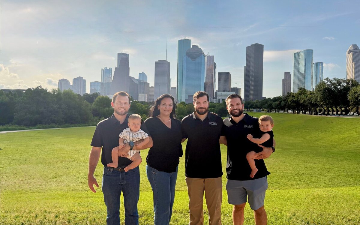 Marilu and her sons Pablo, Andre and Estevan — the family behind Haven Renovations — in front of the Houston skyline