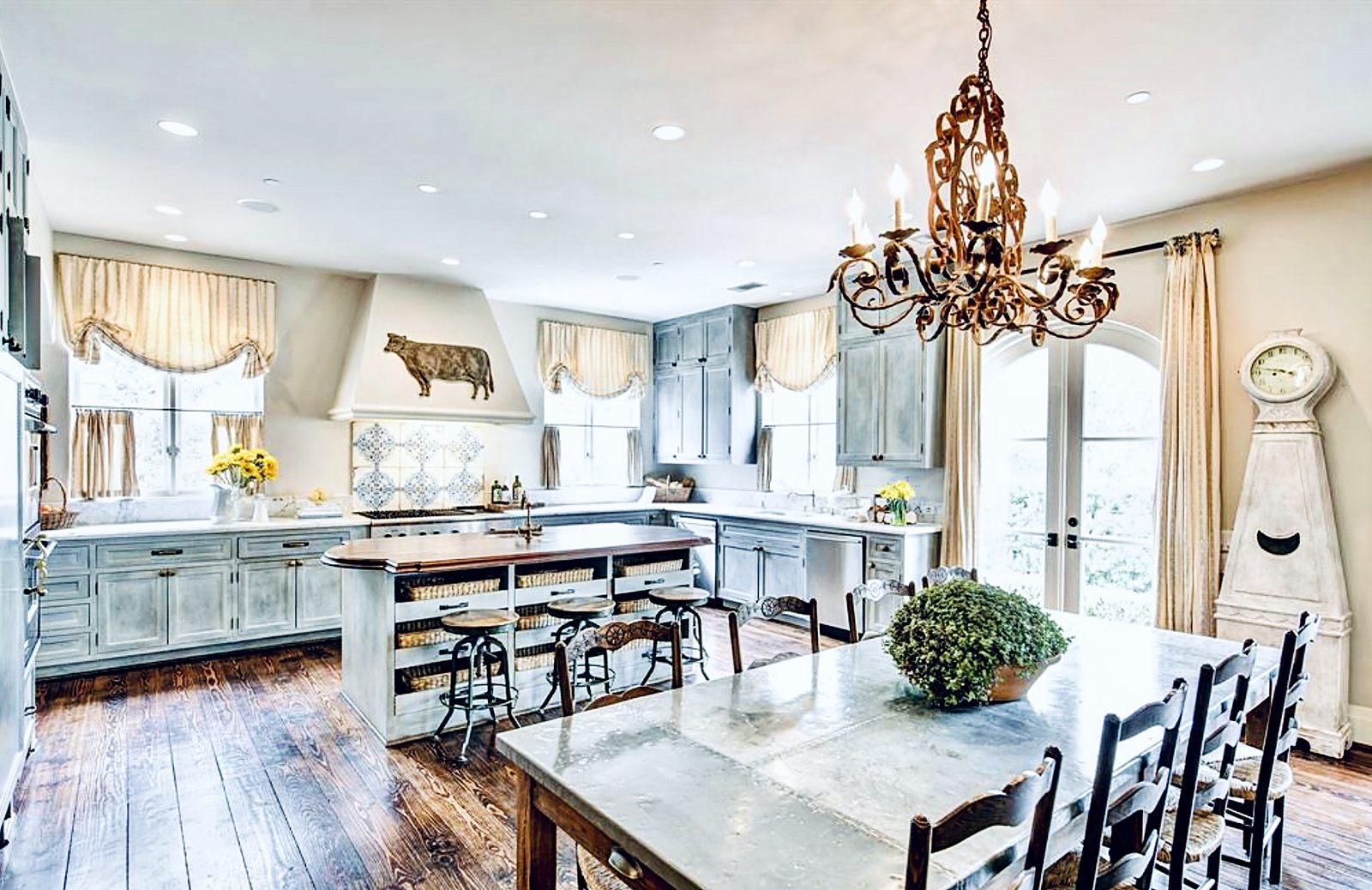 Custom kitchen by Haven Renovations — painted cabinetry, open plan