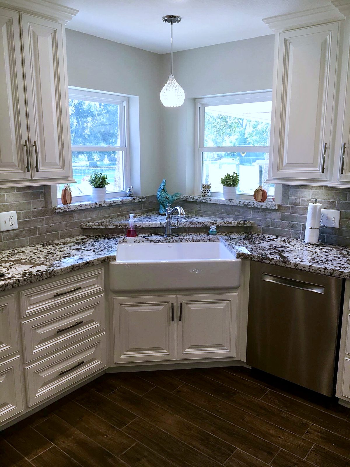 Custom kitchen by Haven Renovations — apron front, granite counters